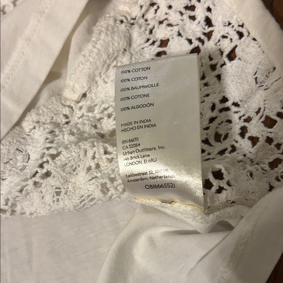 Anthropology Pilcro White Lace Leopard Graphic Crop Top with crochet accent. - Picture 6 of 8